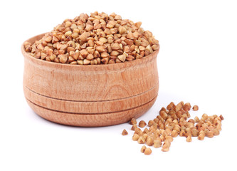 buckwheat on wooden bowl isolated on white background