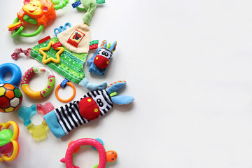 Fototapeta na wymiar Children's toys and accessorieson a White background.view from above 
