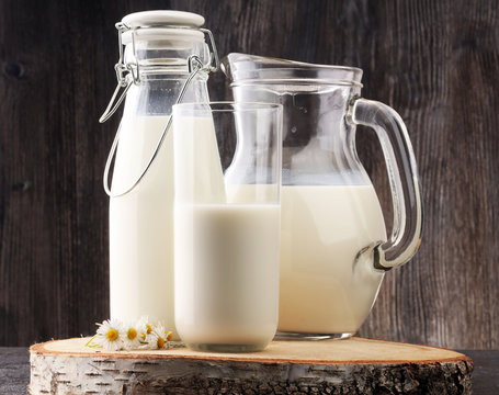 Milk jug and glass milk - healthy lifestyle concept