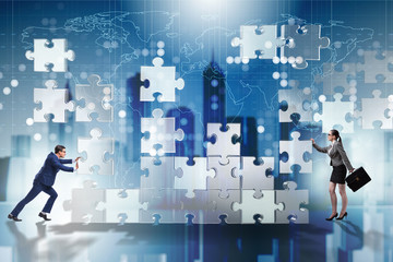 Business concept of teamwork with puzzle pieces