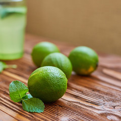 Fresh drink photo of home made limonade on wooden background