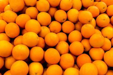 Fresh organic oranges sold on market