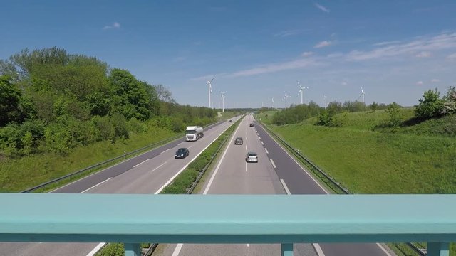 time lapse of traffic on a german highway on a sunny day - dolly shot - camera sliding