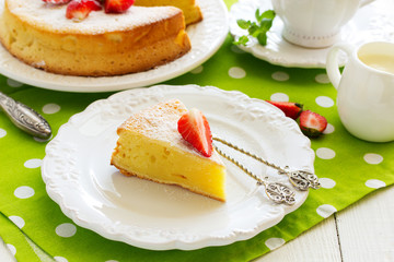 Cheese (curd pudding) with strawberry.