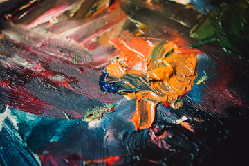 Abstract bright background with oil paint colorful smears macro