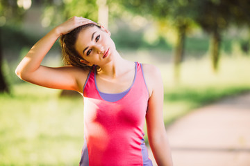 Woman is stretching before jogging. Fitness and lifestyle concept.