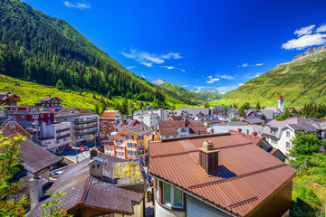 Naklejka premium Andermatt village with Swiss Alps in the background, Switzerland, Europe.