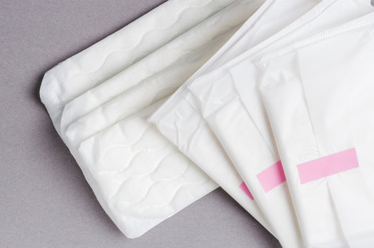 Menstruation sanitary pad for woman hygiene protection. Critical days. Medical conception
