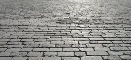 Foto op Plexiglas Old cobblestone pavement. © Vlad Ivantcov