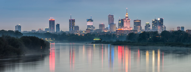 Night panorama of Warsaw skyline, Poland, over Vistula river in the night - obrazy, fototapety, plakaty