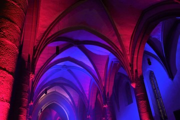 Church with romantic lighting in several colors.