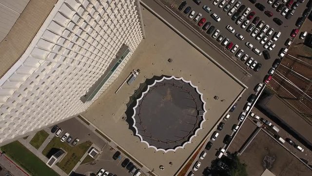 White house Regional Administration building from above. Vladivostok capital of Primorsky Krai, Russia. Large business building at central square. Cinematic aerial drone high flight 4k
