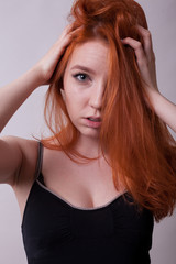 Gorgeous Sexy Busty Redhead Woman In Studio Photo On Gray Background Sexuality And Sensuality Gorgeous Sexy Busty Redhead Woman In Studio Photo On Gray Background Sexuality And Sensuality