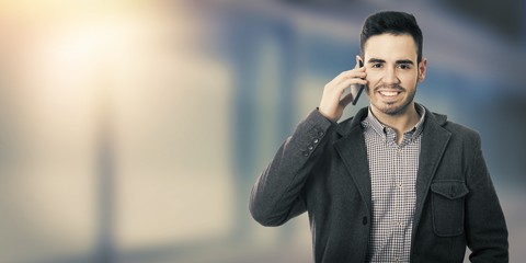 young talking on mobile phone man