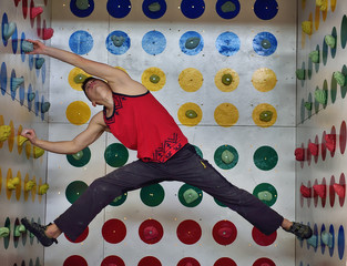 man playing in climber twister
