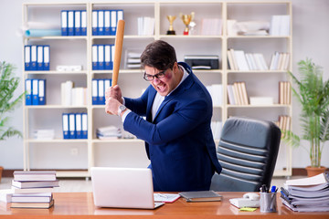 Angry aggressive businessman in the office