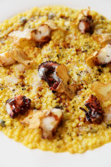 Fregola pasta with grilled octopus