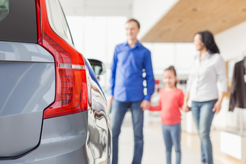 International family buying a new car