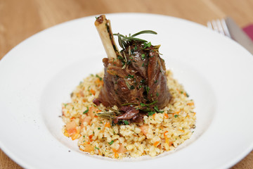 Braised lamb shank with bulgur