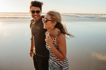 Man and woman on beach holiday