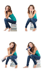Fototapeta premium Student sitting on stack of books