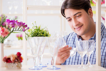 Young handsome man shopping in shop