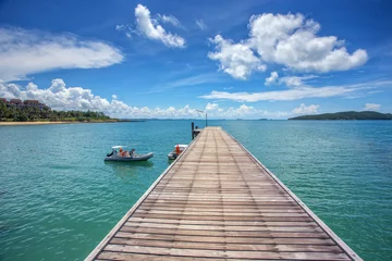 Fotobehang Wooden plank pier bridge with seascape © narongcp