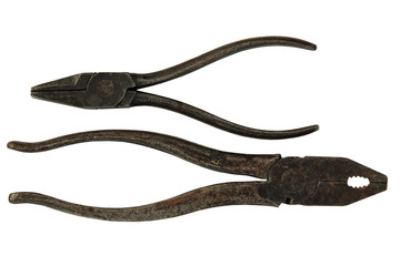 Two old metal pliers isolated on white.