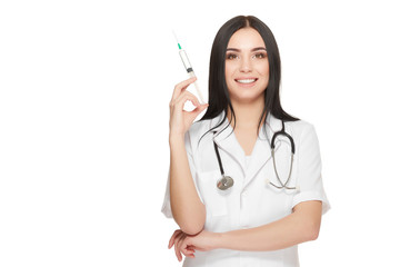 Beautiful nurse at hospital posing with injection in hand.