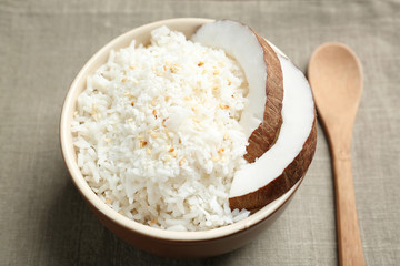 Bowl with coconut rice on table