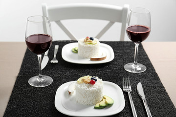 Plate with delicious tasty coconut rice on table