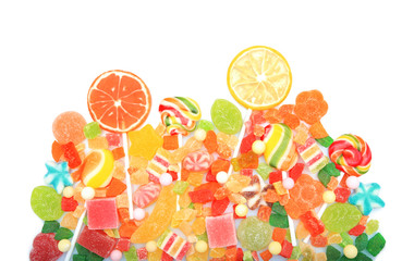 Lollipops and colorful jelly candies on white background