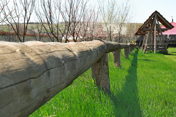 Fototapeta premium Wooden enclosure in orchard on farm