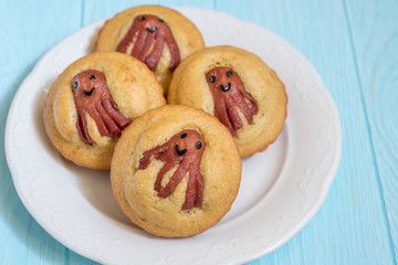 Kid funny food. Cornbread muffins with sausage octopus