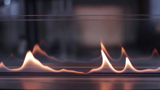 Eko kamin in an apartment or house. Has a very beautiful, attractive and presentable appearance. He works on ecologically clean fuel, odorless and colorless. Fire behind the glass. Decorative heater.