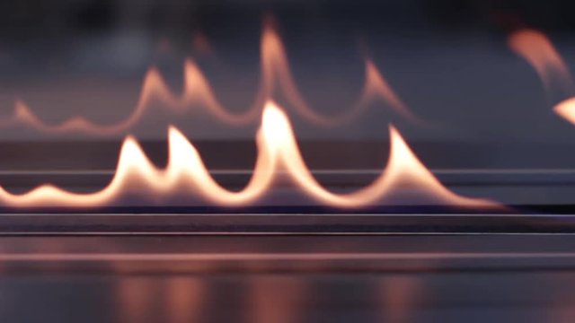 Eko kamin in an apartment or house. Has a very beautiful, attractive and presentable appearance. He works on ecologically clean fuel, odorless and colorless. Fire behind the glass. Decorative heater.