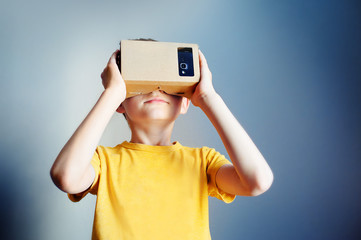 Toddler boy using a new virtual reality headset
