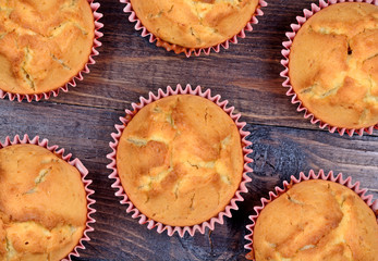 Heap of muffins on table