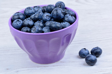 Blueberry in a ceramic bowl on table
