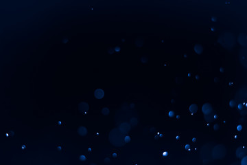 Bokeh Background Very dark cyan - lime green.