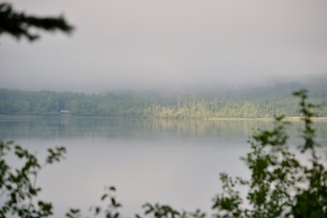 Obraz na płótnie Canvas foggy lake morning