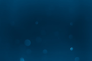 Bokeh Background  Very dark blue.