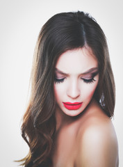 Fototapeta premium Portrait of beautiful young woman . Isolated on white background