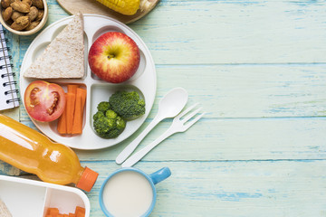 Healthy lunch box on wooden background