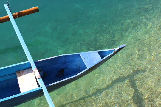 Blue boat at sulamadaha beach