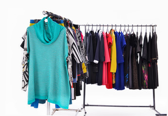 Set of Variety of casual female clothing on hangers

