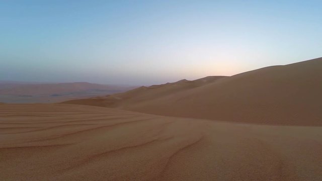 sunrise in Liwa desert, part of Empty Quarter, the largest sand desert in the world