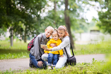 Mom with children doing selfie