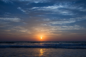 Obraz na płótnie Canvas Amazing sunset at Arambol beach, North Goa, India
