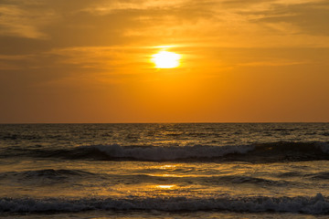 Obraz premium Amazing sunset at Arambol beach, North Goa, India